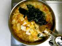 辣白菜炖豆腐汤的做法步骤6